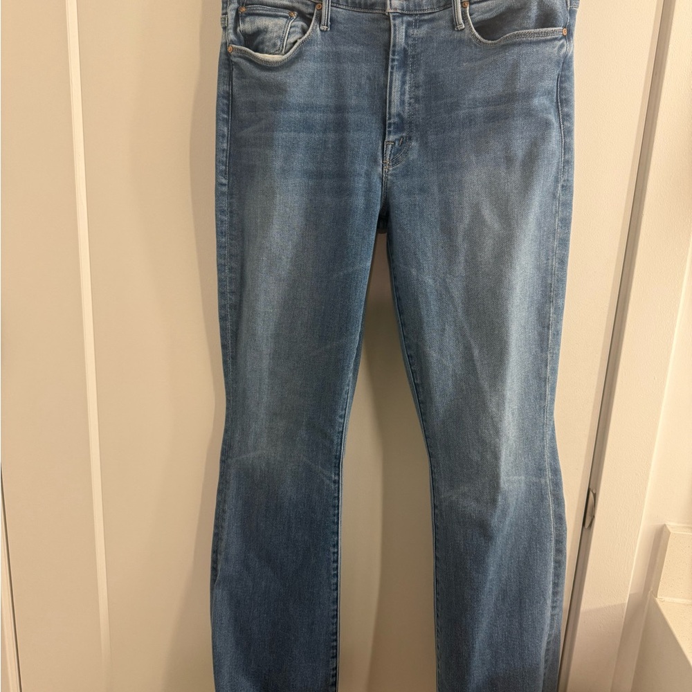 MOTHER The Weekender Mid Rise Flare Jeans.